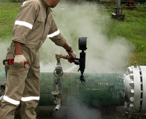 Man working in drilling fluid